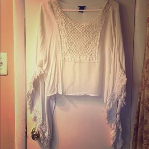 White boho blouse size: small. Flowers and fringe